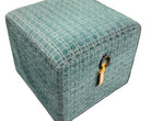 Green patterned box with a gold ribbon on a white background