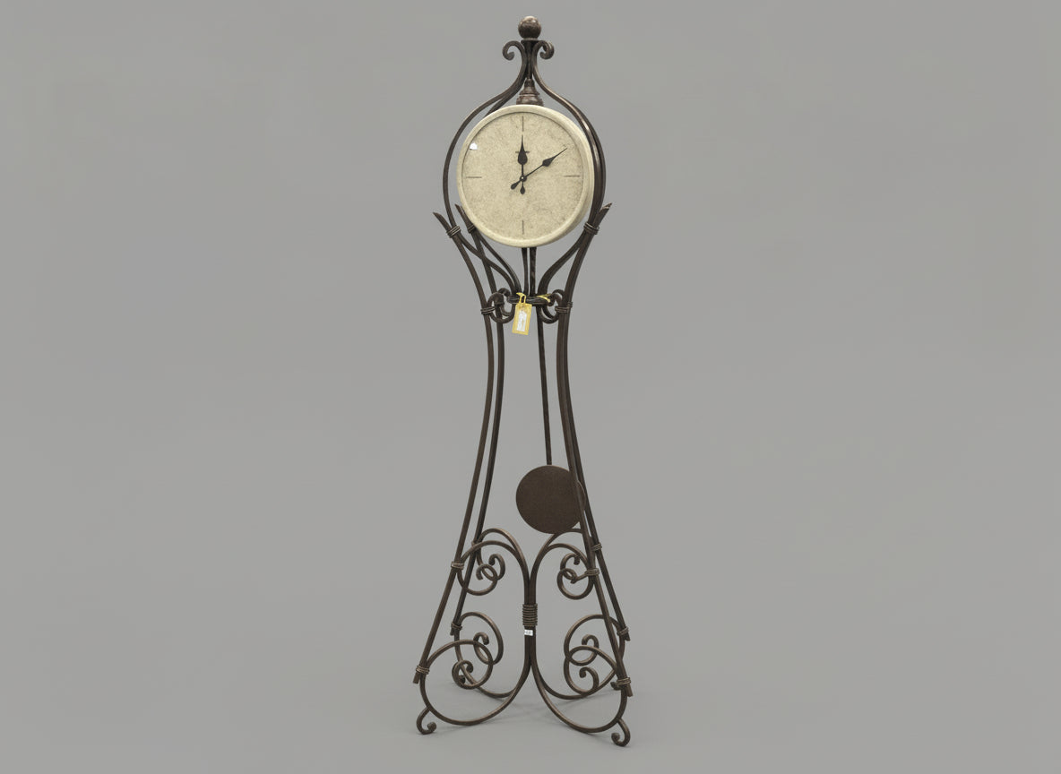 Decorative wall clock with intricate design on a gray background